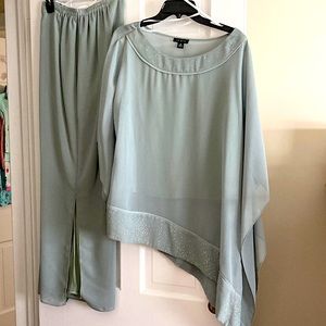 2 piece lined dressy pants set with sparkle hem. New condition